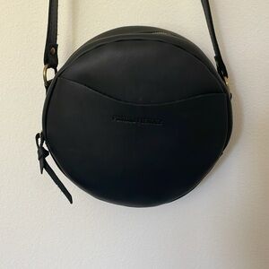 Portland leather black round crossbody purse